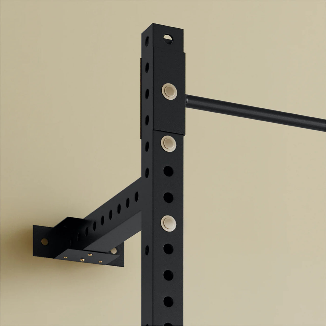 Compact Fitbol wall rack with pull-up bar for small home gyms